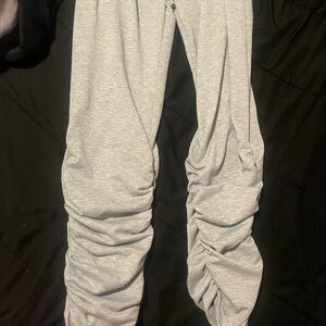 Stacked grey sweats